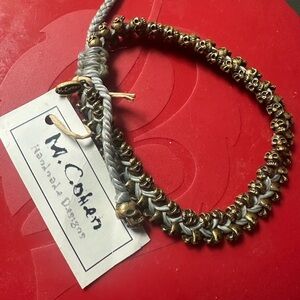 M. Cohen Skull Beaded Cord Braided Bracelet (Brass/Gold in color) Adjustable
